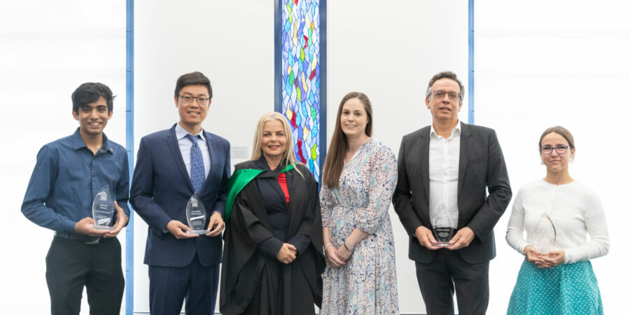 (L-R) Isuka Muthumuni, Andy Xu, Mrs Maria McIvor - Principal, Mrs Emma Dawson - President of the Old Collegian Association, Raymond Merlano (Dad of Nathan Merlano's in his absence) and Tameika Anderson